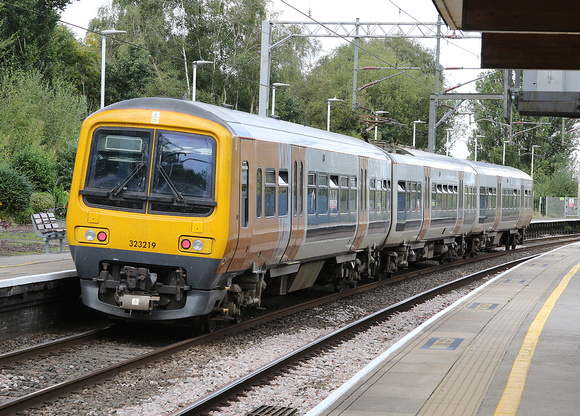 323 219